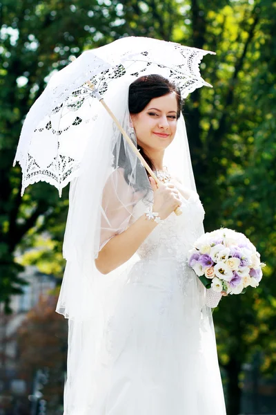 bride with umbrella