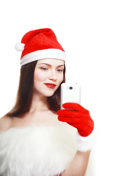 Santa flicka med mobiltelefon — Stockfoto