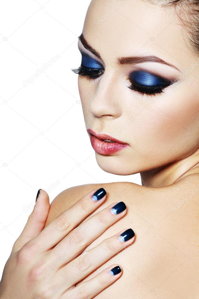 woman with brightly blue make-up