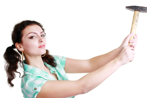 Vrouw met hamer in verhoogde handen — Stockfoto