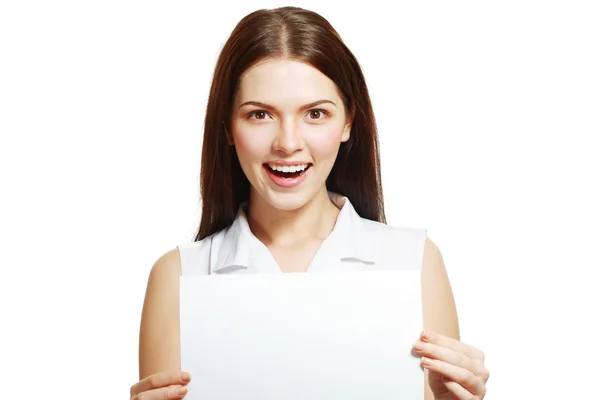 Woman holds out a blank A4 — Stock Photo, Image