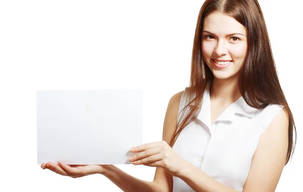 Woman holds out a blank A4 card — Stock Photo, Image