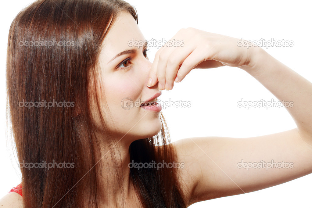 Woman Holding her Nose