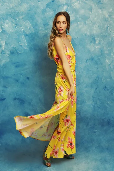 Portrait Beautiful Woman Yellow Dress Posing Blue Color Background — Fotografia de Stock