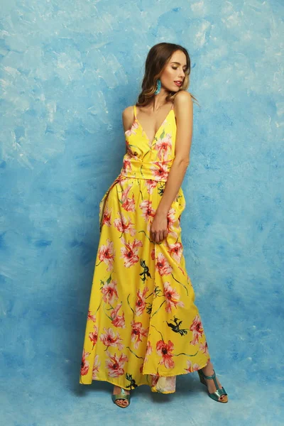 Portrait Beautiful Woman Yellow Dress Smiling Posing Blue Color Background — Fotografia de Stock