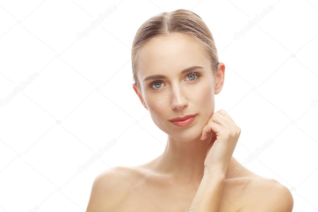 Portrait of beautiful woman with natural makeup holding hand near her face isolated over white background
