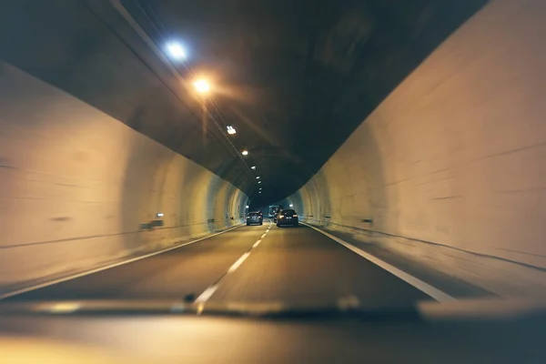 tunnel auto road in northen Italia go through Alps