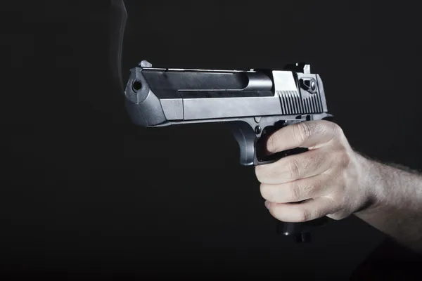 Mano con pistola — Foto Stock