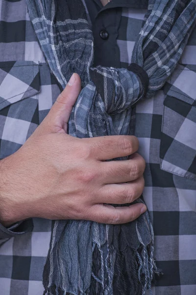 Hand holding a scarf — Stock Photo, Image