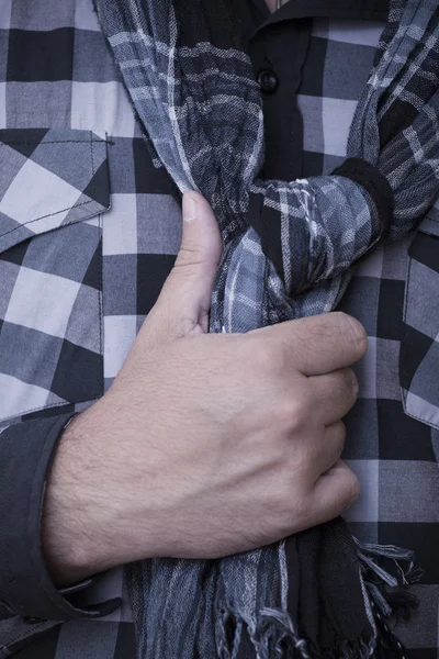 Hand holding a scarf — Stock Photo, Image
