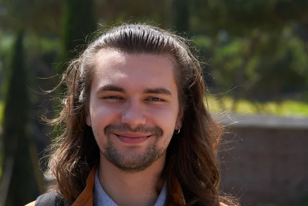 Portrait of young man guy smiles happy