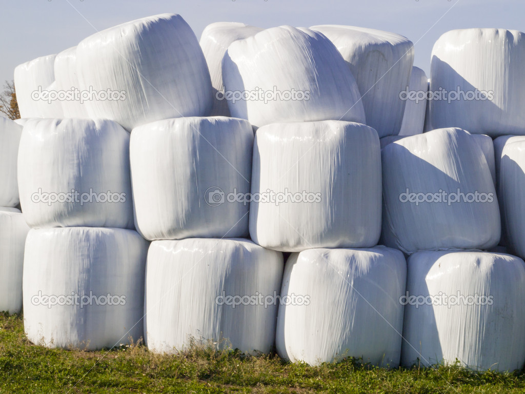 Bale of straw in a plastic bag