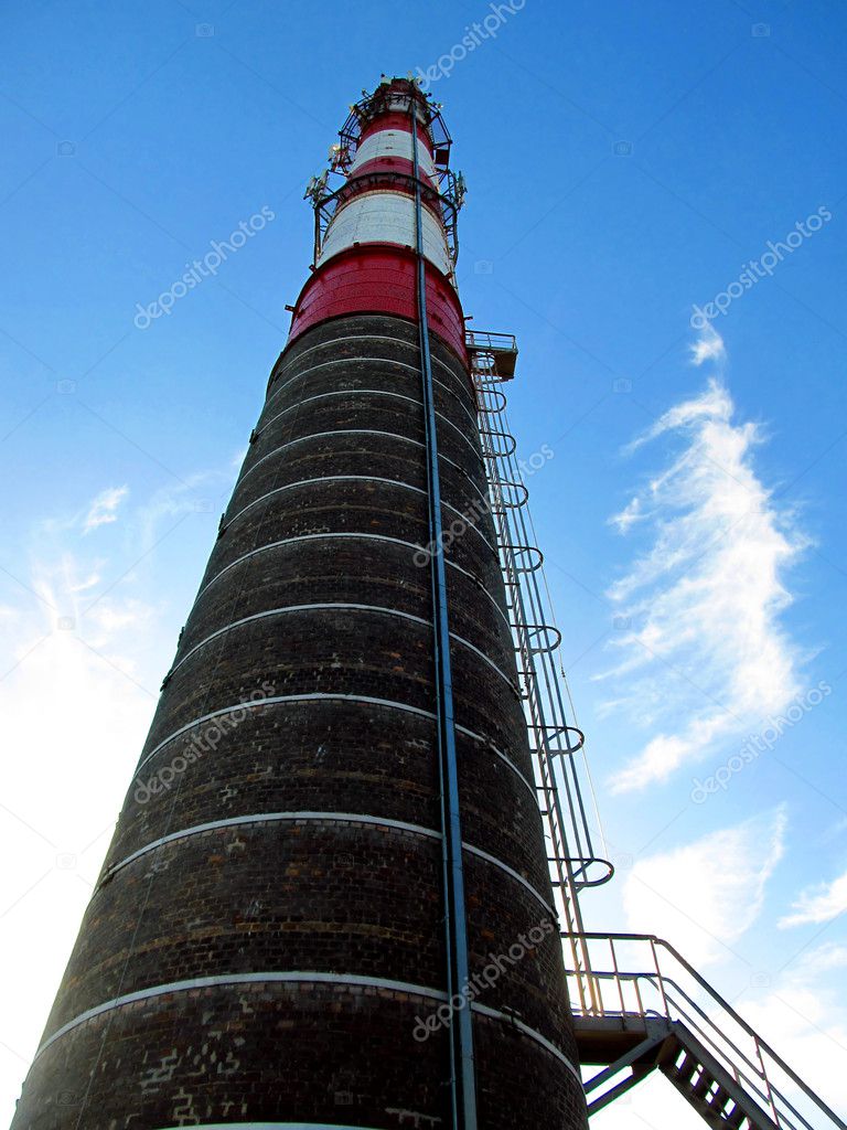 Old white and red industrial chimney