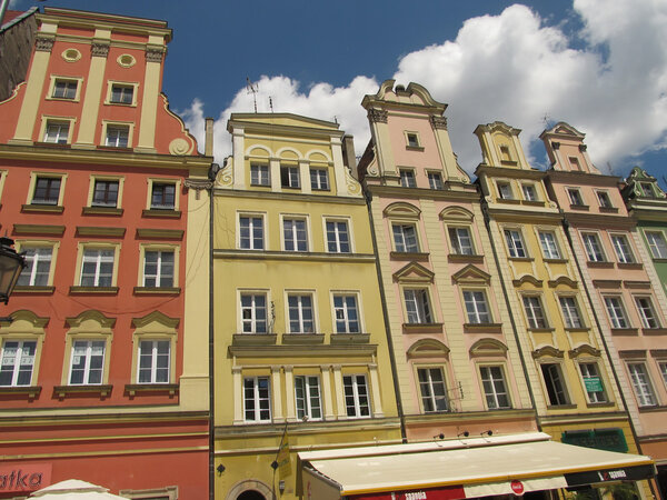 Fragment of colorful facade of old historic buildings in Wroclaw, Poland
