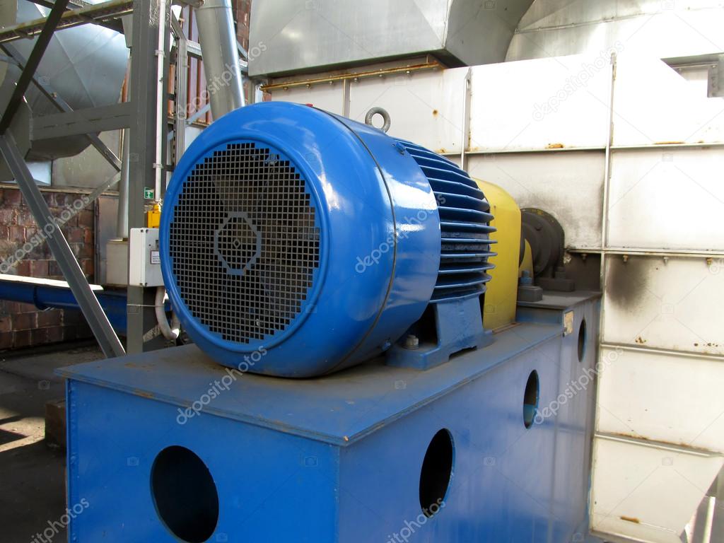 large electric motor of blue color as the drive to the fan