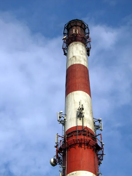 Red-white high concrete chimney outlet of heat — Stock Photo, Image