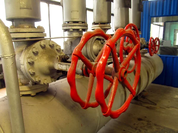 Ipes and valves with red knobs — Stock Photo, Image
