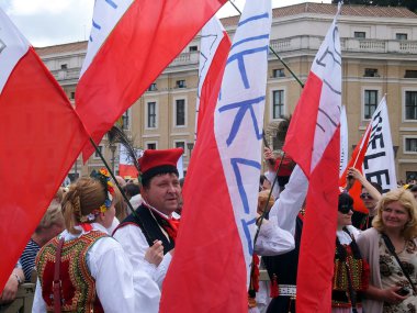 ROME, VATICAN - April 28, 2014: the joy of Polish pilgrims to St clipart