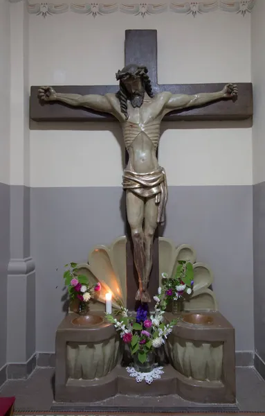 stock image Sokolka, POLAND - September 24, 2021: Church of St. Anthony in Sokolka, Poland, the site of the Eucharistic miracle. Cross with water bottles at the entrance to the church