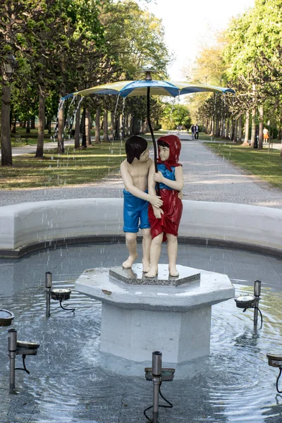 Hansel and Gretel over the boy, girl, fountain. Ciechocinek, Poland - May 09, 2022 Artistic statue of Hansel and Gretel in the municipal spa park in Ciechocinek.