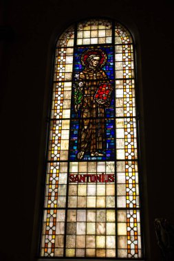 Wejherowo, Poland, May 14, 2022: The interior of the church of St. Trinity Church in Wejherowo, Poland. Stained glass window with St. Antoni.