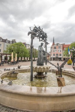 Wejherowo, Poland - May 14, 2022: Fountain with the effigy of St. Francis on the market square in Wejherowo, Poland
