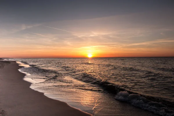 Sunset on the beach on the Baltic Sea in Jastrzebia Gora in Poland in the month of May