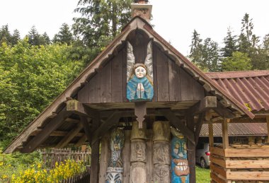 Zabnica, Poland, July 27, 2022: Wayside shrines and saints and various sculptures in the village of Zabnica in the Beskid Zywiecki mountains in Poland.