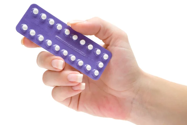 Drží antikoncepční pilulky — Stock fotografie