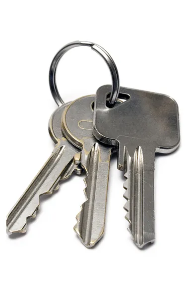 串三个公寓钥匙 — 图库照片