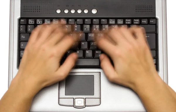 Escribir en un ordenador portátil con desenfoque de movimiento — Foto de Stock