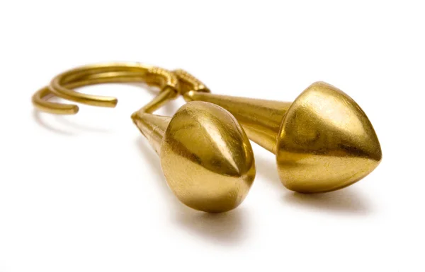 Goldene Ohrringe — Stockfoto