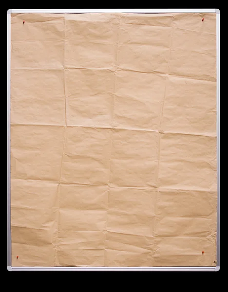 Papel de embalaje marrón en una pizarra blanca con ruta de recorte —  Fotos de Stock