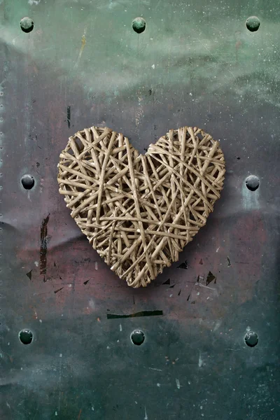 Wood heart on old metal background — Stock Photo, Image