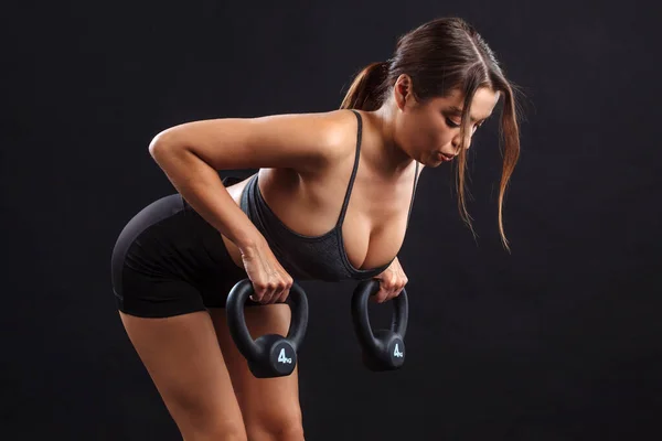 Fit Young Woman Lifting Kettle Bells Exercise Her Upper Back — Stock Photo, Image