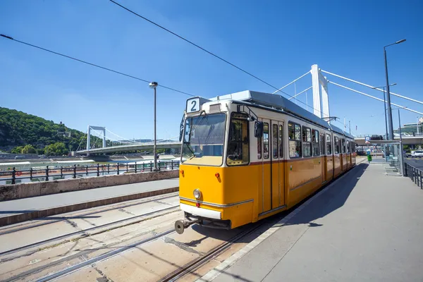 Yellow tram on the river bank of Danube in Budapest — Stock Photo, Image