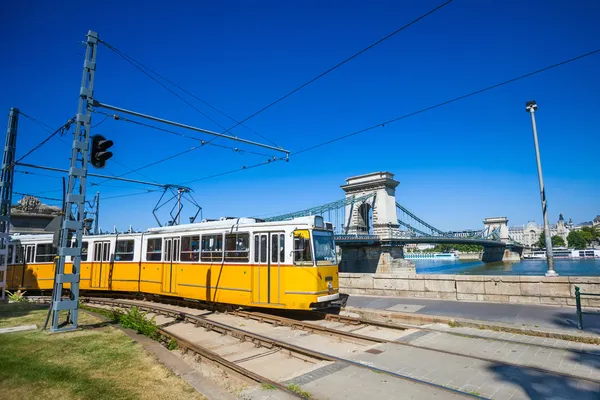 Yellow tram on the river bank of Danube in Budapest — Stock Photo, Image