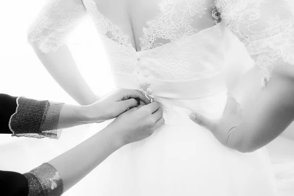 Bride getting dressed — Stock Photo, Image