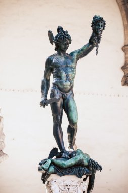 Perseus holding head of Medusa clipart