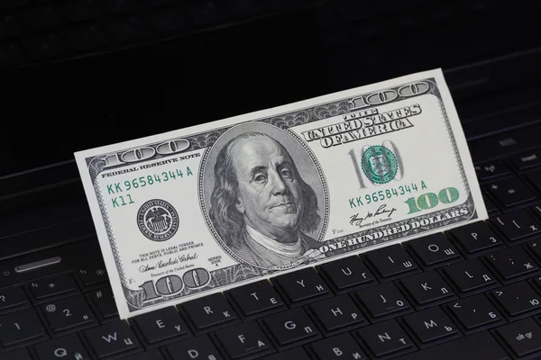 Money on a keyboard — Stock Photo, Image