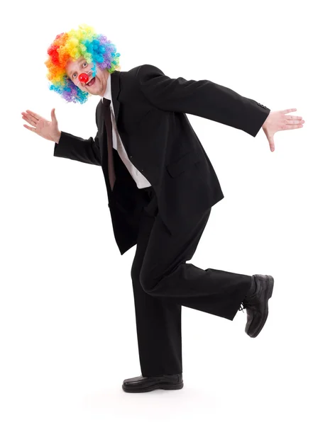 Happy business man with clown wig — Stock Photo, Image