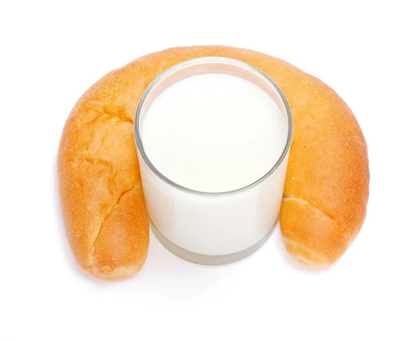 Glass of milk and crescent — Stock Photo, Image