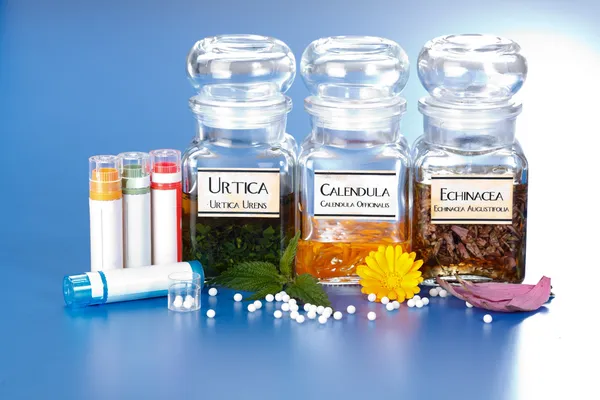 Various plant extract in bottles and homeopathic medication — Stock Photo, Image