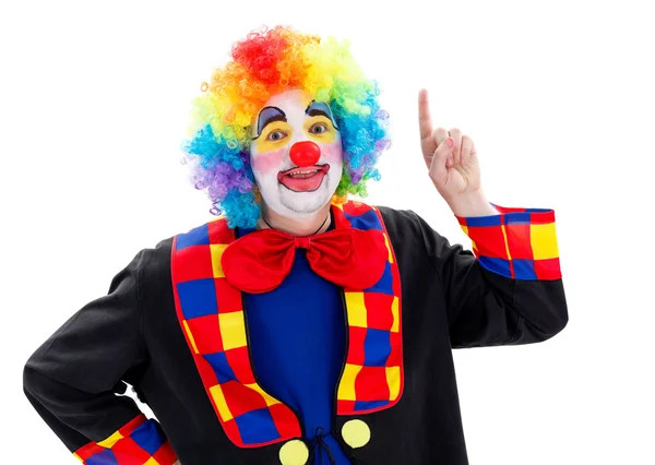 Fröhlicher Clown zeigt nach oben — Stockfoto