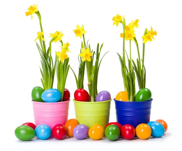 Easter with daffodils and colorful painted eggs — Stock Photo, Image