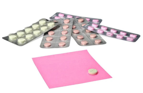 Verschillende pillen en Opmerking papier — Stockfoto