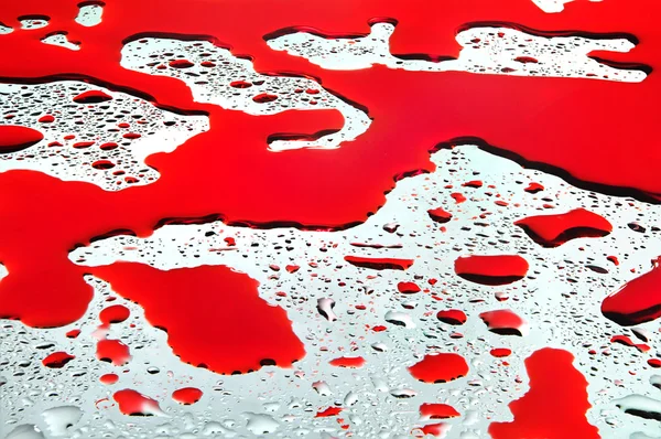 Waterdruppels en bloed — Stockfoto