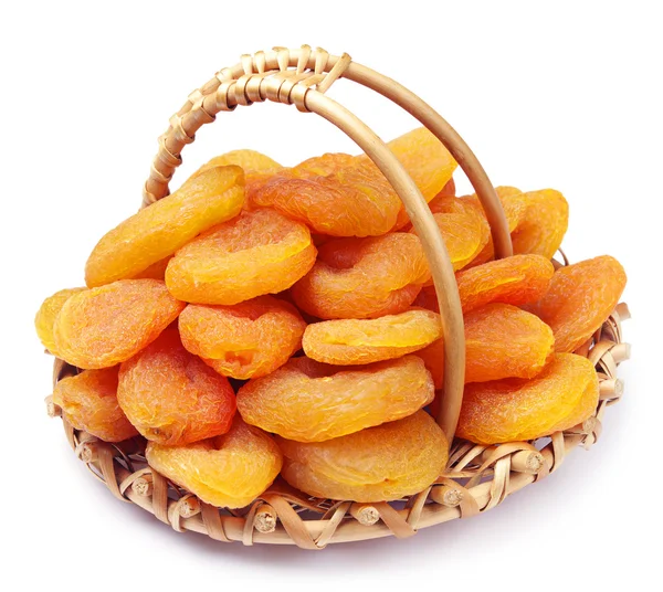 Dried apricots in a basket — Stock Photo, Image