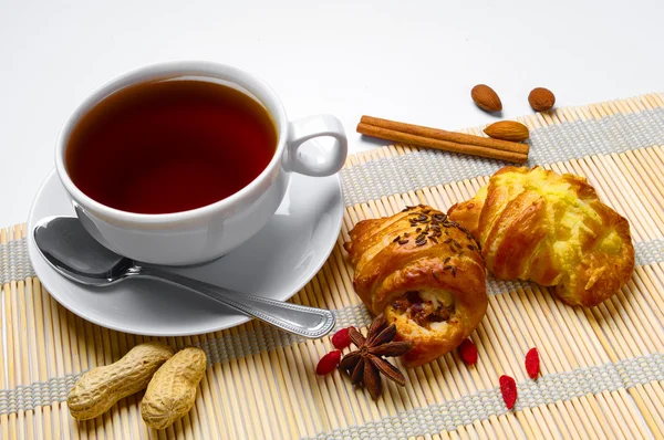 Cup of tea and cakes — Stock Photo, Image