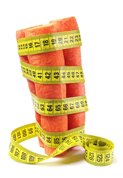 Carrots and measuring tape — Stock Photo, Image